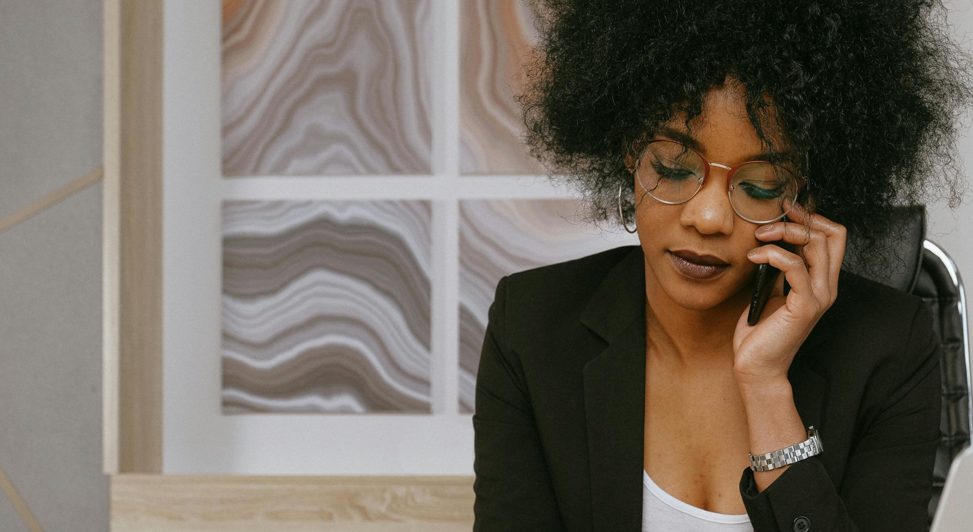 Woman In Black Blazer Holding Smartphone